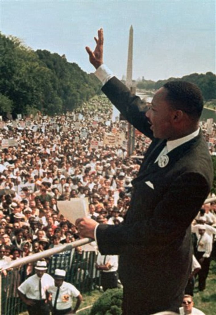FILE - This Aug. 28, 1963, file photo shows Dr. Martin Luther King Jr. acknowledging the crowd at the Lincoln Memorial for his \"I Have a Dream\" speech during the March on Washington. Monday, Jan. 17, 2011, marks the 25th federal observance of the birth of King, one of America's most celebrated citizens, and the only non-U.S. president to be honored with a national holiday.  (AP Photo/File)